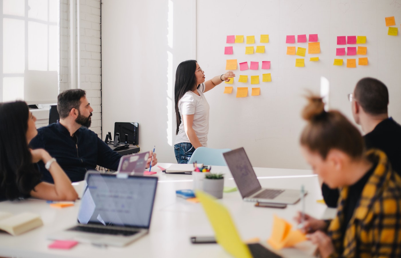 Business advisers reviewing strategy in a boardroom