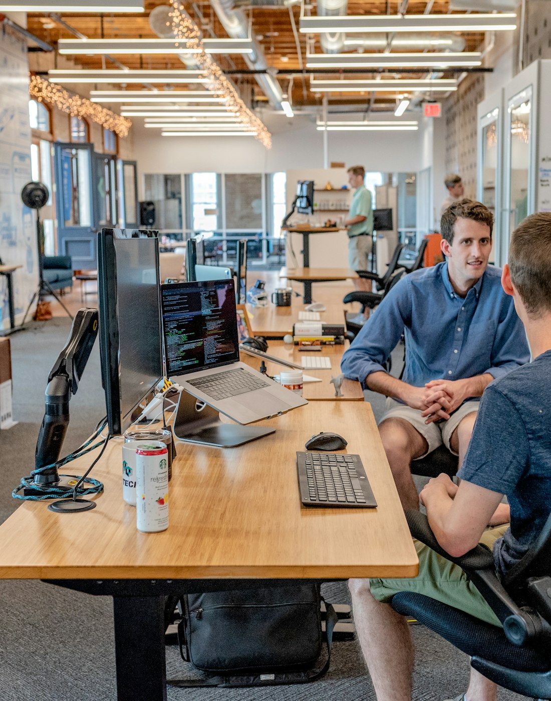 Two business partners reviewing documents together
